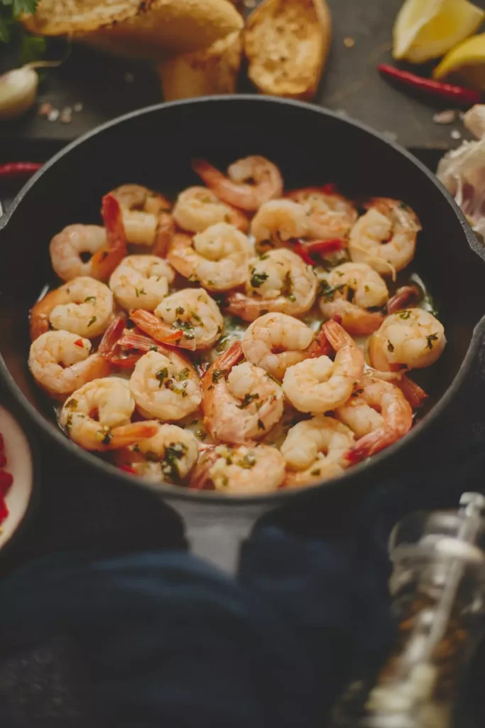 shrimps being heated in a pan