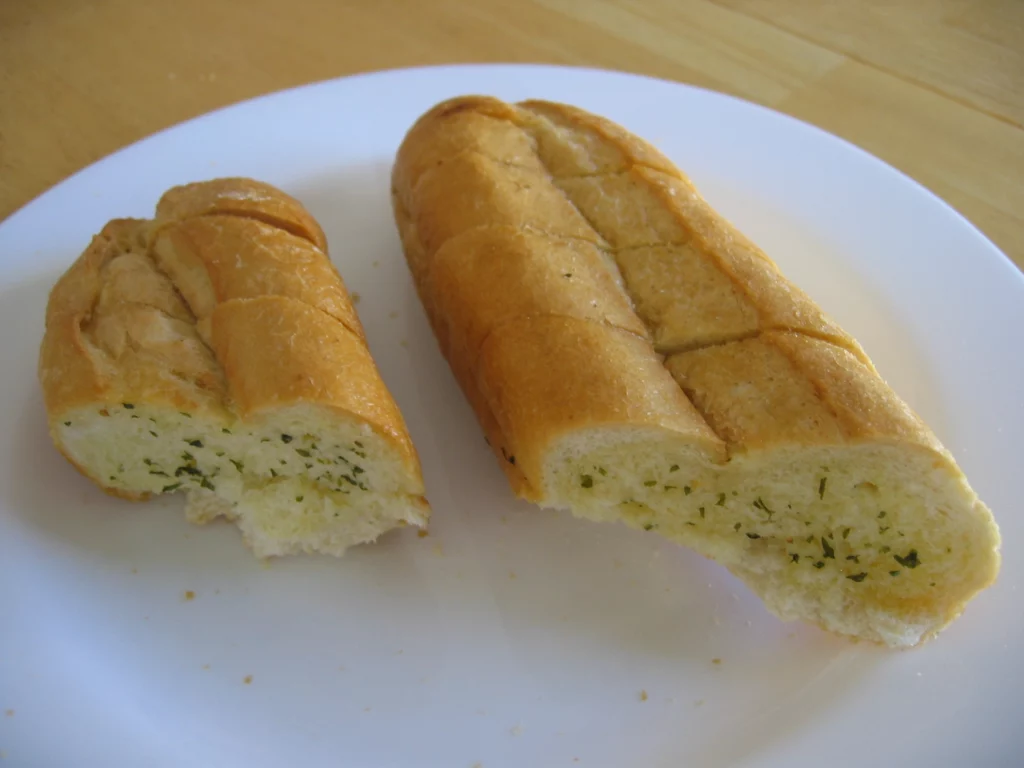 pieces of garlic bread in a plate