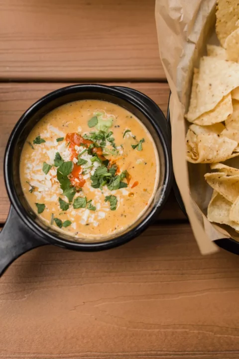 queso cheese dip with nachos