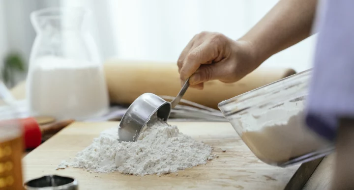 pouring-flour-onto-board